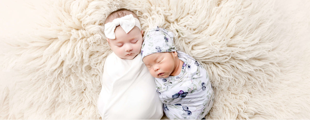 newborn swaddled babies