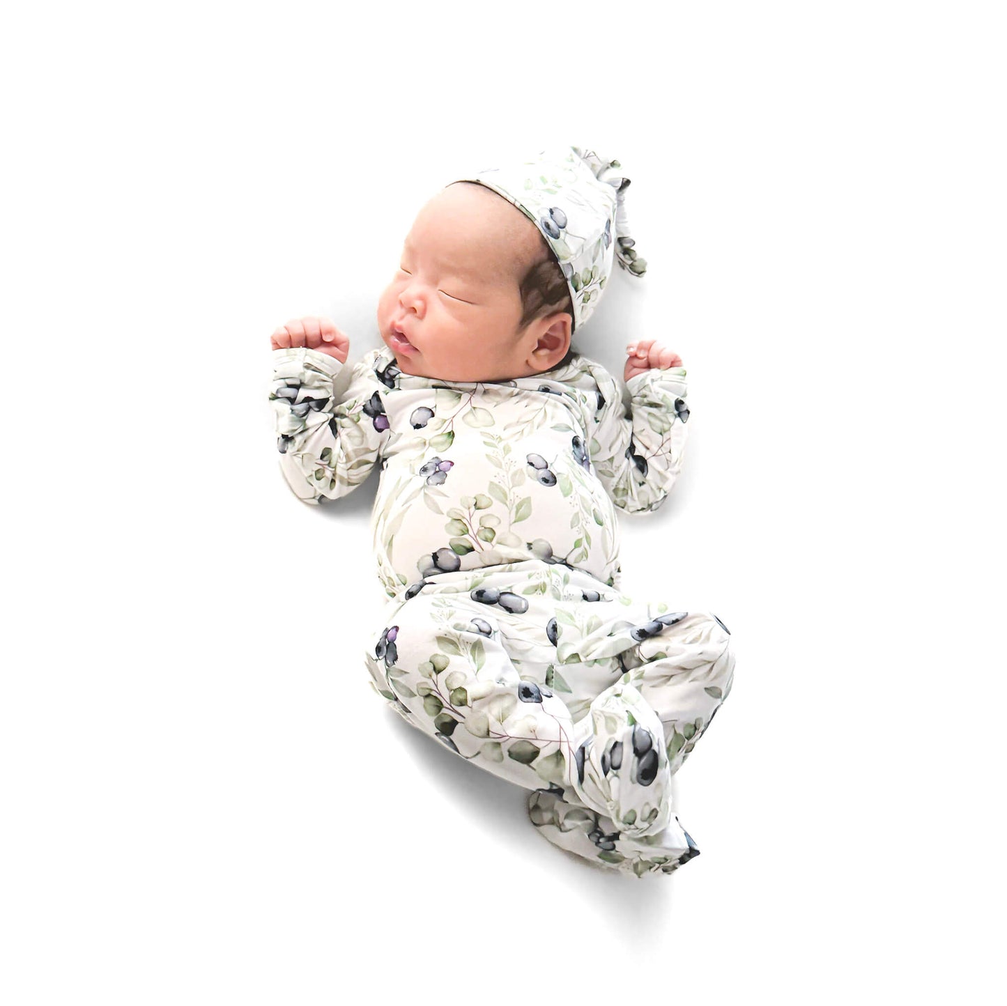 Newborn baby a blueberry set with hat on a white background