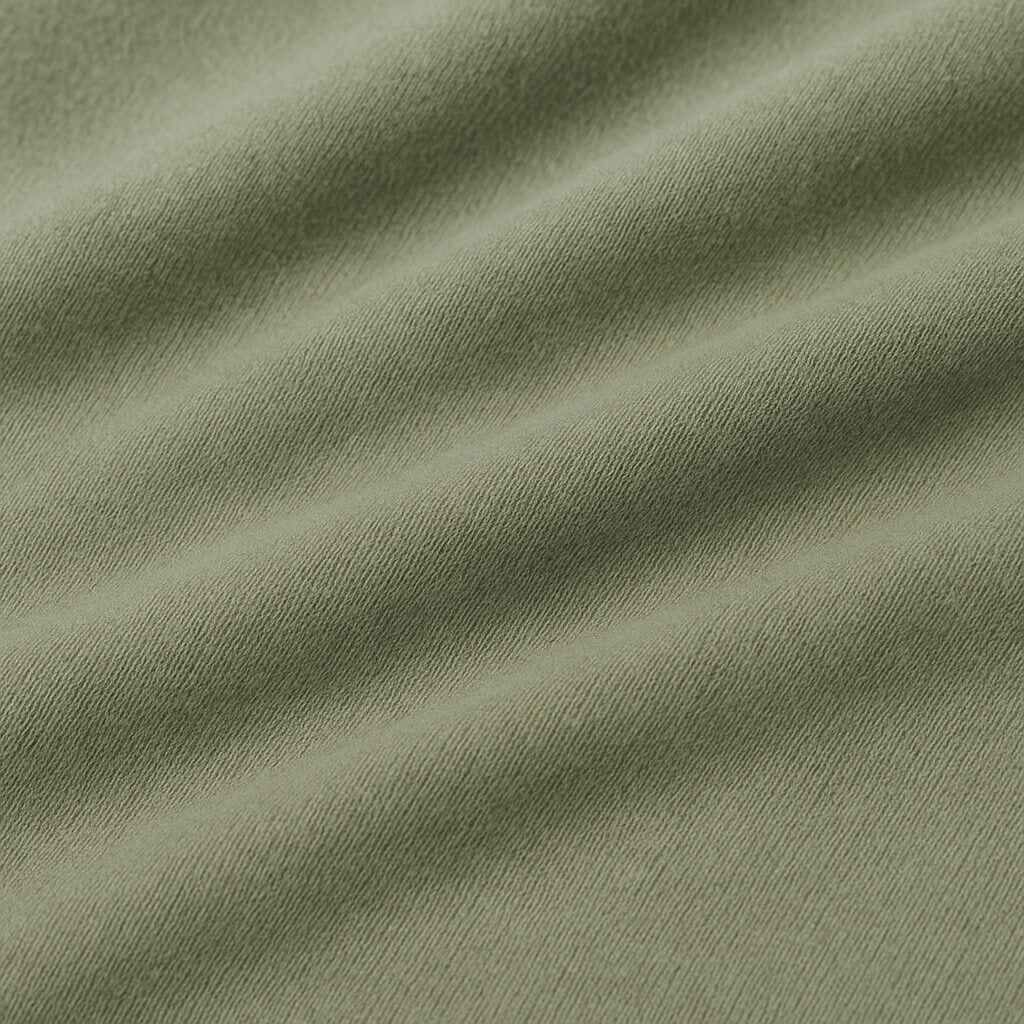Close-up of green fabric with visible texture