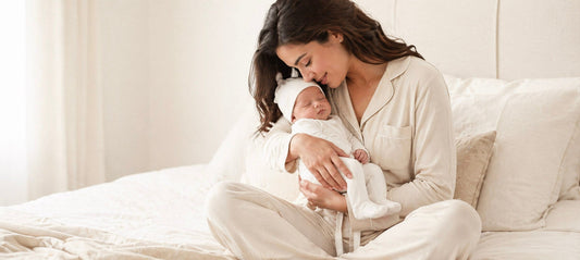 mom holding baby