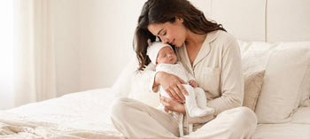 mom holding baby