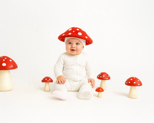 baby wearing mushroom costume