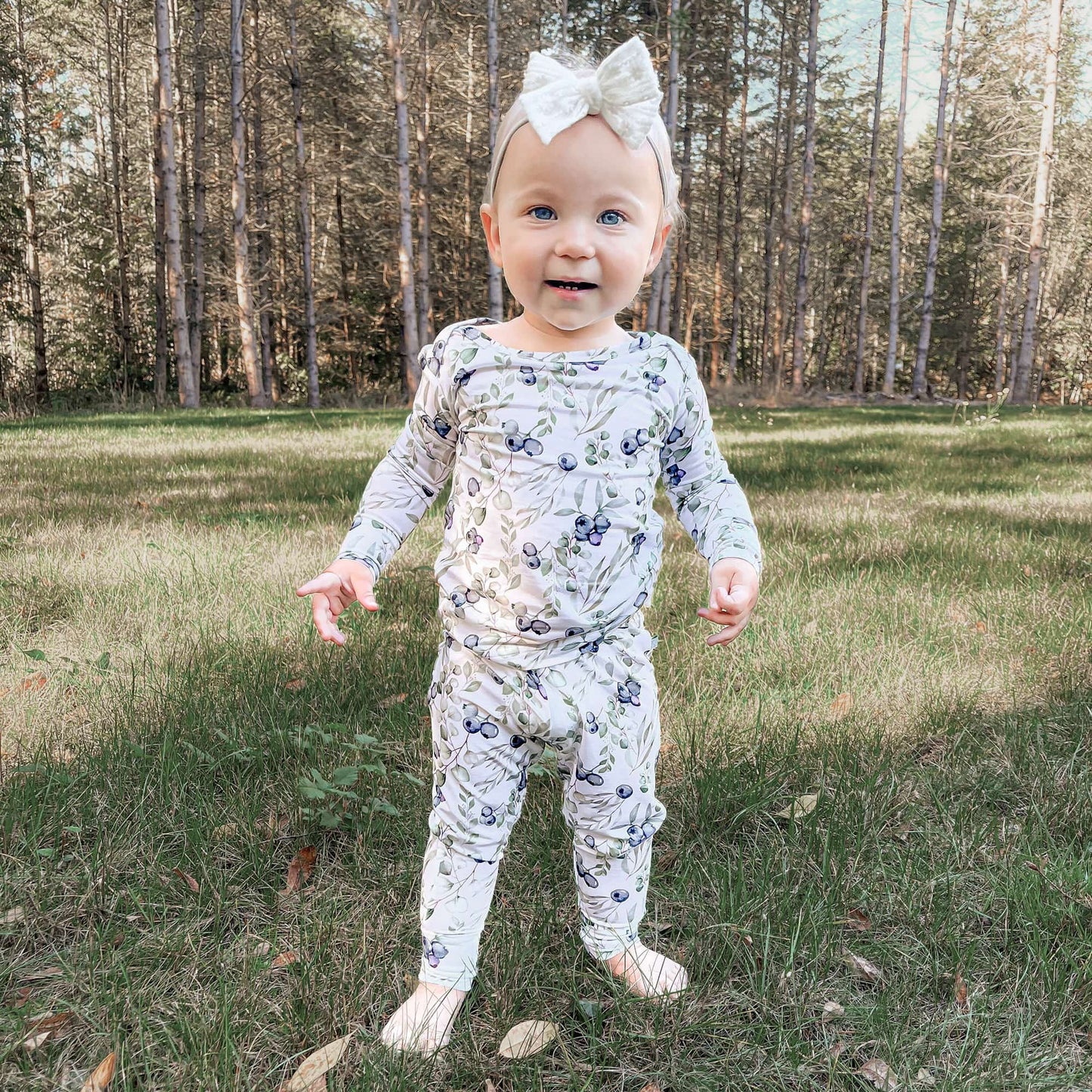 Toddler girl wearing blueberries 2 piece baby pajamas 