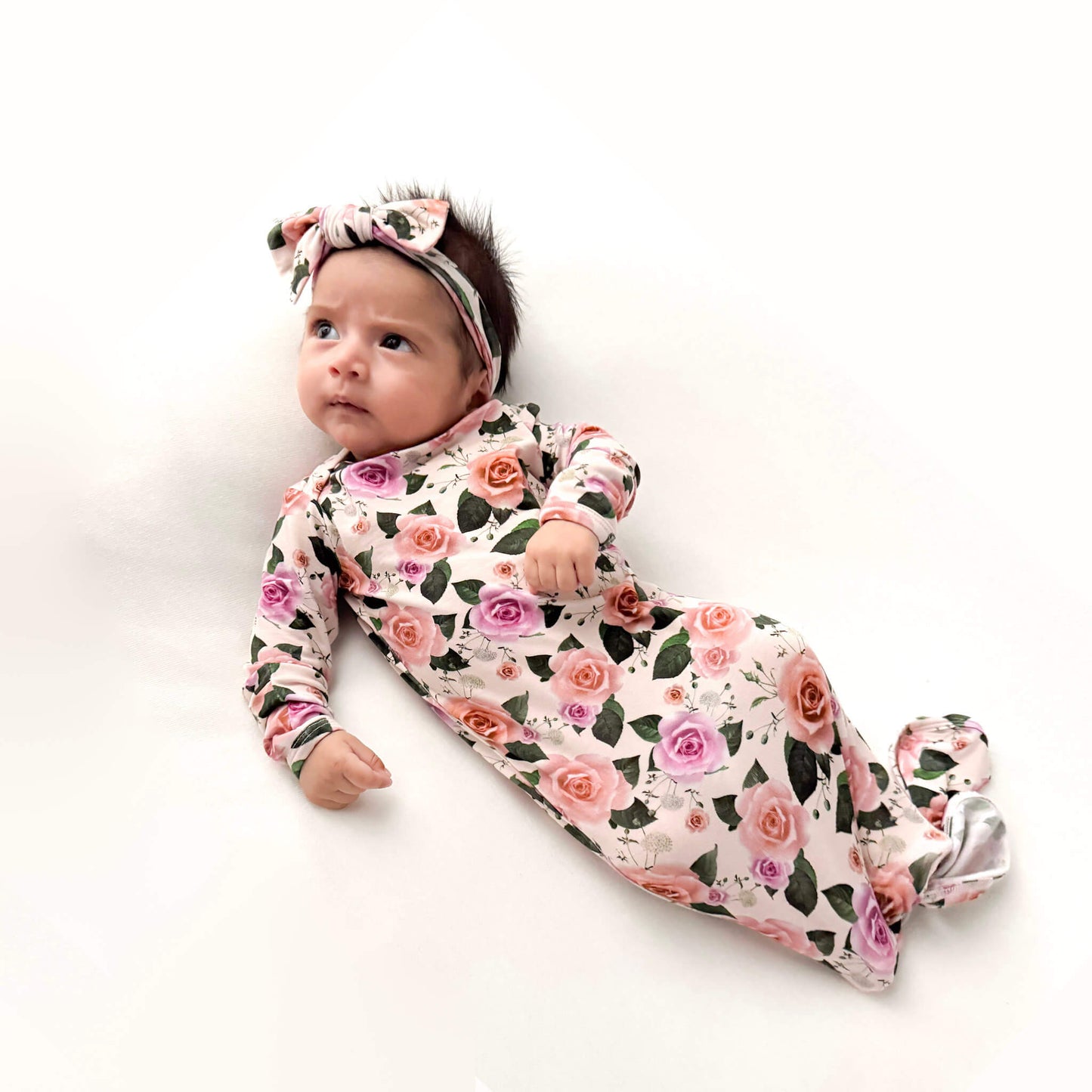 baby girl wearing floral gown