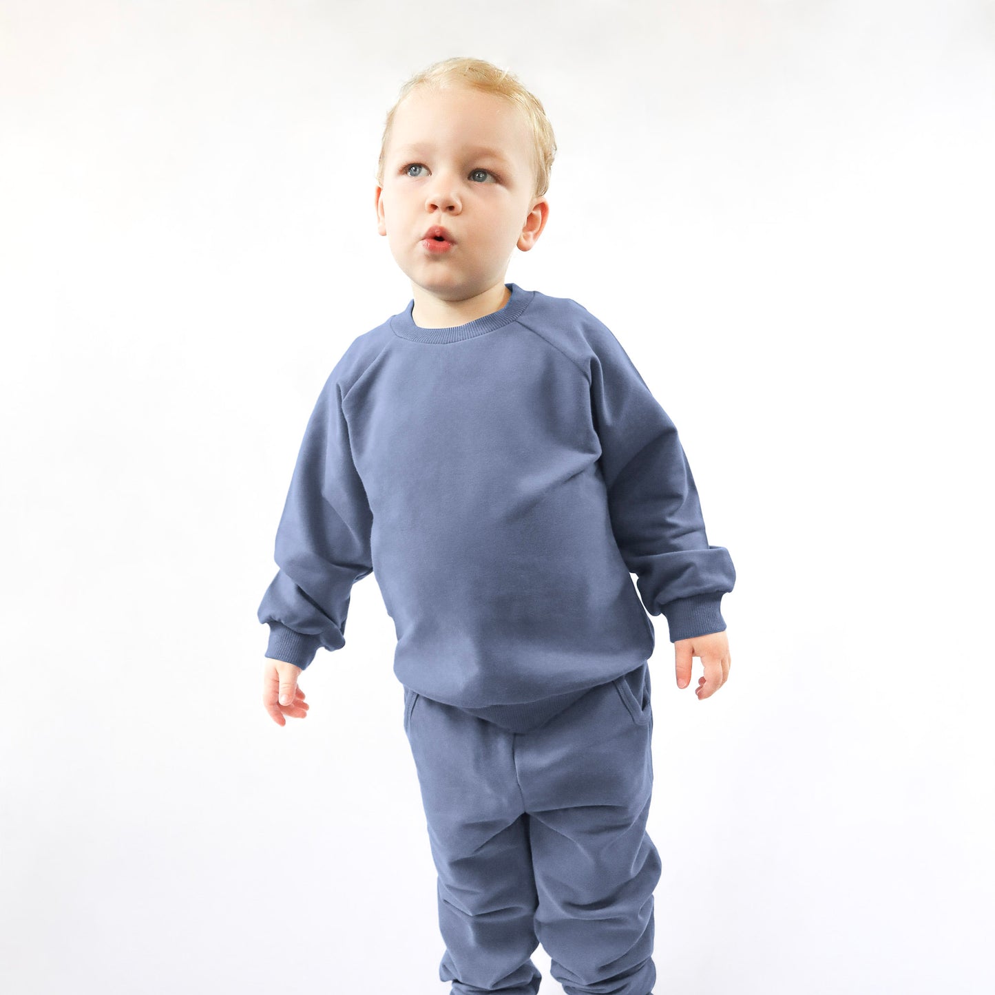 toddler standing up wearing jogger set