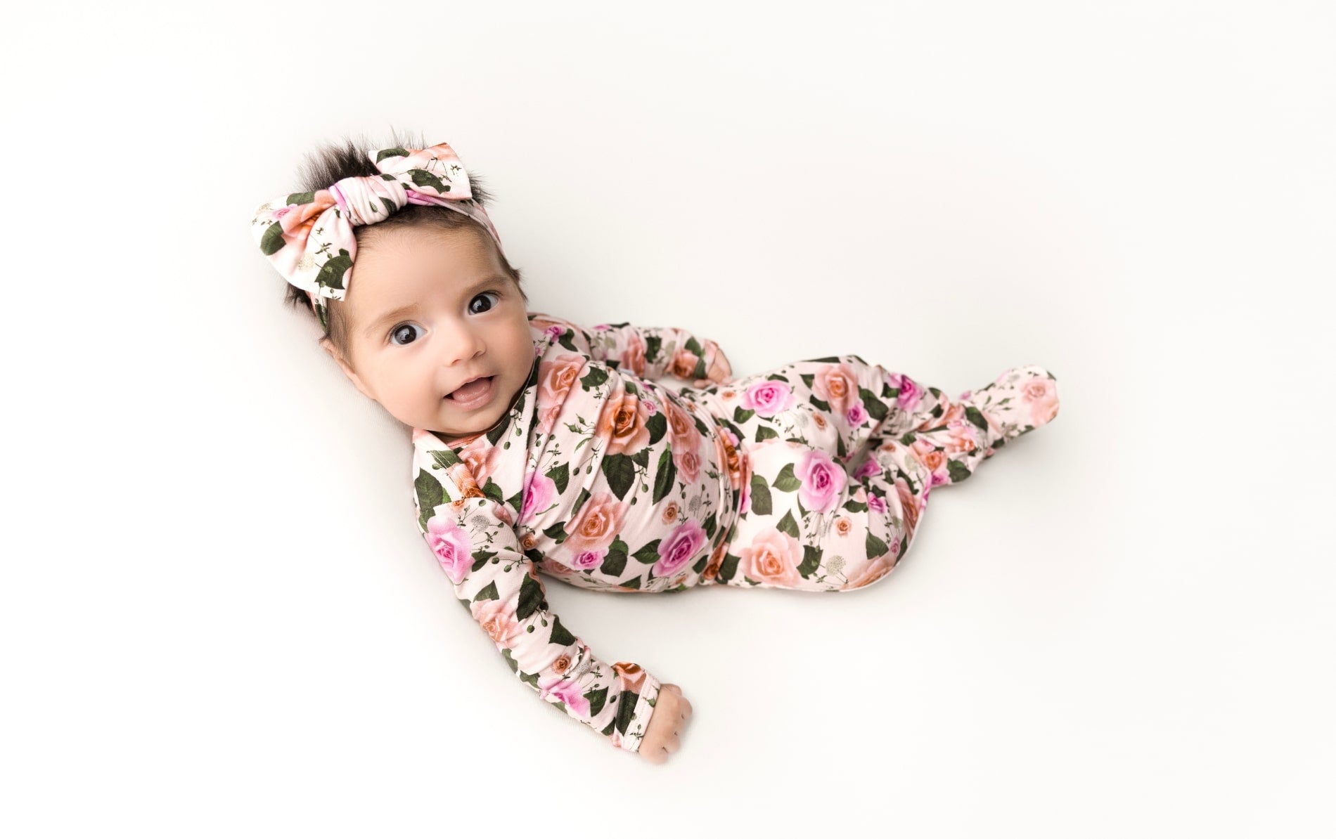 Baby-girl-wearing-newborn-roses-set