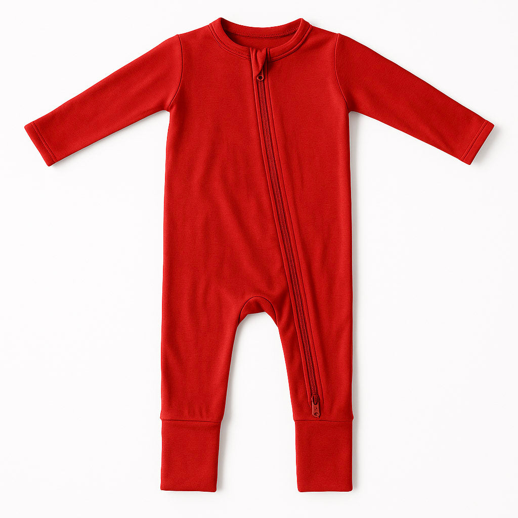 Red baby footie on a white background