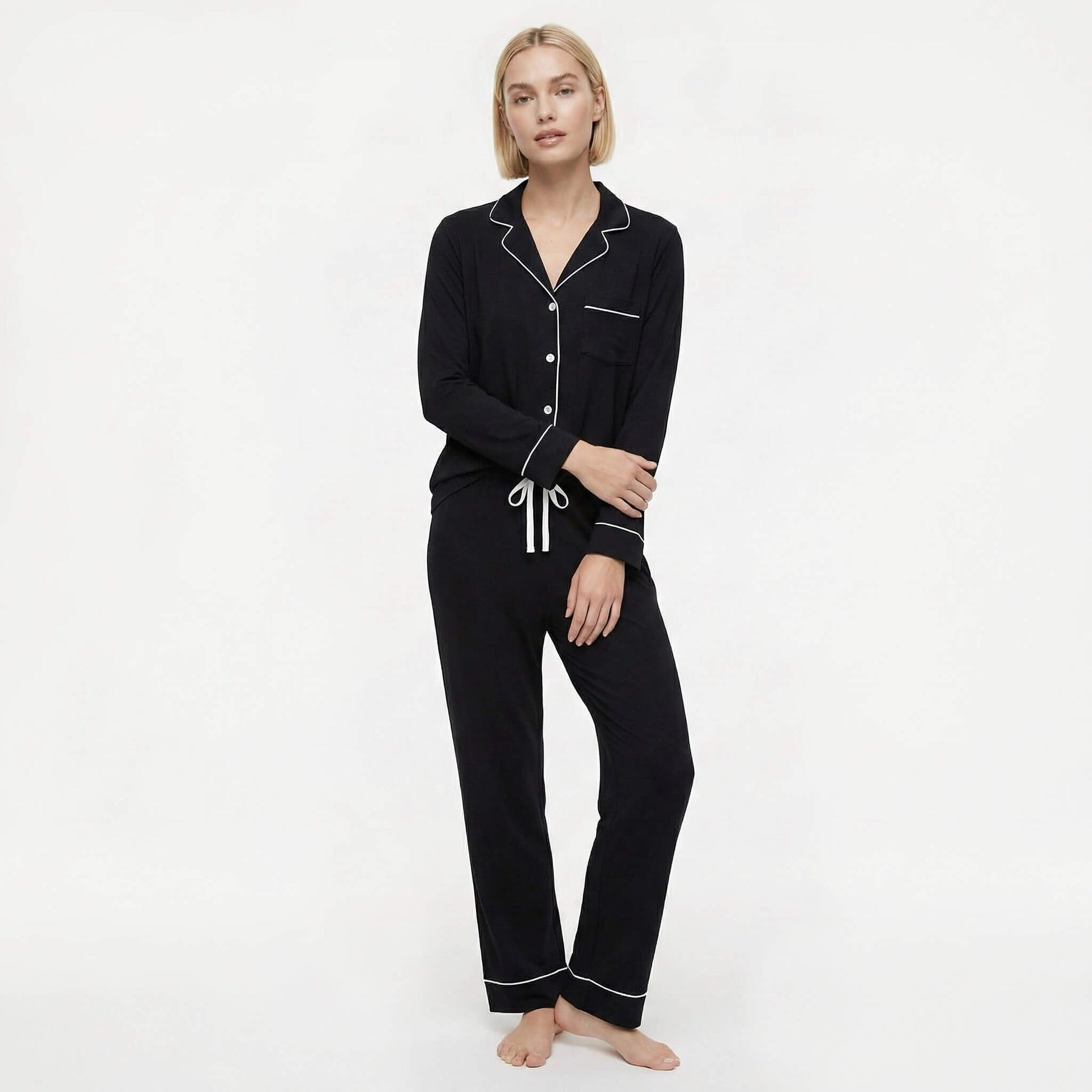 woman wearing black long sleeve pajama set